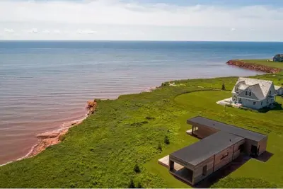 Image de Neuf, face à l'océan, moderne Maison de vacances avec accès à Cove
