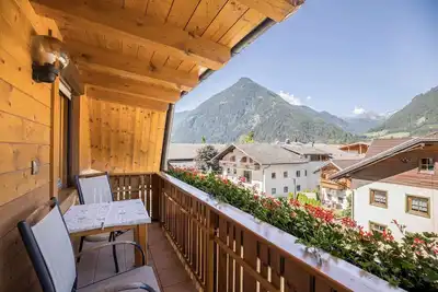 Appartement confortable \"Kornblume - Mesnerhof\" avec vue sur les montagnes, Wi-Fi, balcon et jardin