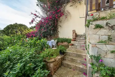 Image de Maison de vacances \"Chia B\" près de la plage avec vue sur la mer et jardin