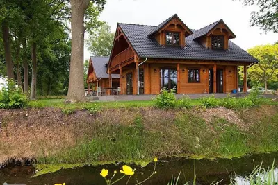 Image de Fantastique villa en bois \"Tine\" avec Wi-Fi, jardin, balcon, terrasse et sauna