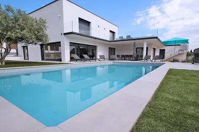 Image de Villa de standing avec piscine privée - 10 personnes - Vue mer - Climatisation - WiFi - Les. . .