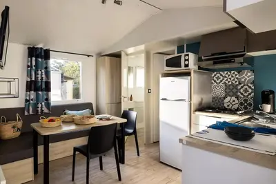 Image de Mobil-home Confort 27m² - 2 chambres + Terrasse couverte + Tv 4 personnes