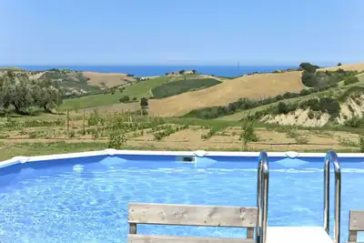 Image de Appartement dans une maison de vacances avec piscine, Wifi, climatisation, bain Ă remous, Tv, patio
