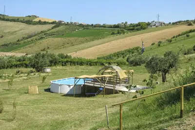 Image de Appartement dans une maison de vacances avec bain à remous, climatisation, Wifi, piscine, Tv, patio
