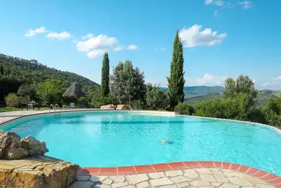 Image de Appartement dans une maison de vacances avec climatisation, piscine, patio, vue panoramique, parking