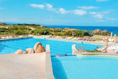 Image de Bel appartement avec piscine, climatisation, Tv, terrasse, animaux admis et parking