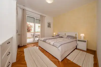 Image de Appartement de deux chambres avec la terrasse Palit, Rab (A-4970-b)