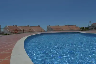 Image de Granny's House, avec une piscine, wi-fi et un balcon avec une vue magnifique sur la mer!