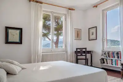 Image de Appartement 'Il Grifo - Cozy House' avec vue sur la mer, jardin privé et Wi-Fi