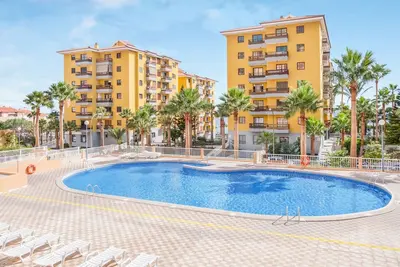 Image de Appartement supérieur sur la plage avec piscine, balcon, vue sur l'océan et Wi-Fi