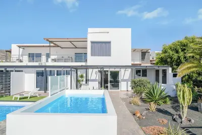 Modern Apartment Casa Amanecer 1 with Pool, Terrace & Wi-Fi; Parking Available