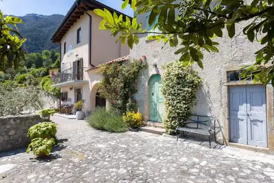 Image de Appartement 'Lancillotto' avec terrasse, jardin et Wi-Fi partagés.