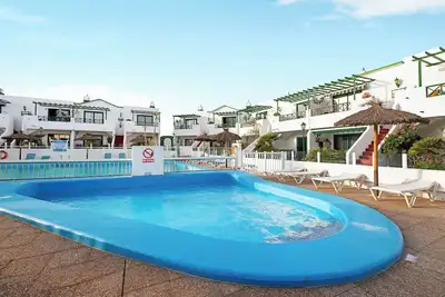 Image de Charmant appartement Los Pocillos, avec piscine, terrasse, balcon & Wi-Fi