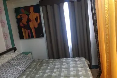Image de Unité de condo confortable avec sécurité 24 heures.