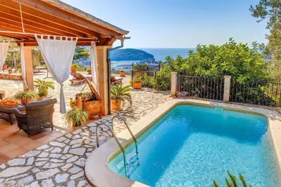 Image de Finca Rural Es Pujol climatisée fantastique avec vue sur mer, piscine, terrasse et Wi-Fi
