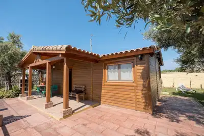 Image de Ideal for sports enthusiasts and near the beach - Casa de madera Naranjo with shared pool
