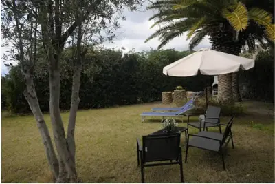 Image de Chalet près de la plage avec connexion internet, jardin et terrasse ; animaux domestiques autorisés