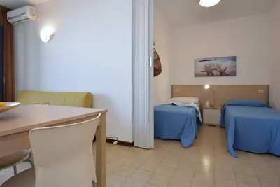 Image de Joli appartement avec climatisation, piscine, Tv, terrasse, animaux admis et parking
