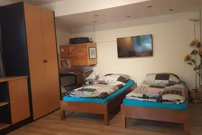 Image de '4er Müggelwaldzimmer' calme + confortable appartement à Köpenick m. Jardin