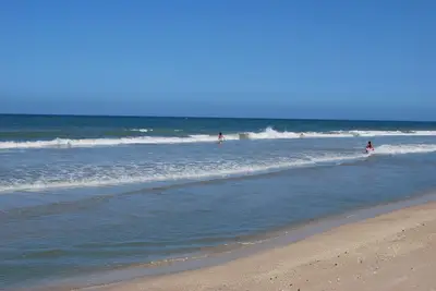 Image de Miles de la plage privée Front Condo avec piscine chauffée