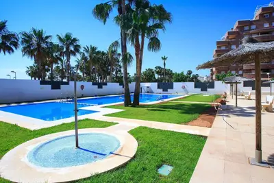 Image de Bel appartement avec Wifi, piscine, climatisation, Tv, terrasse, animaux admis et parking