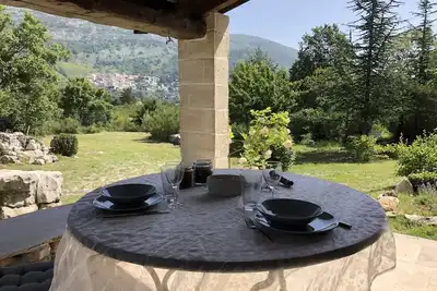 Image de House with a magical view of the medieval village of Coursegoules. 30 min from the beaches