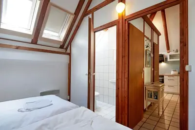 Image de Joli appartement dans une maison de vacances pour 6 personnes avec Wifi, climatisation, Tv et patio