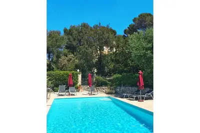 Image de Appartement dans une maison de vacances avec piscine, Wifi, climatisation, Tv, terrasse, parking