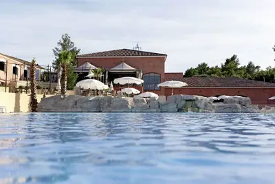 Image de Appartement dans une maison de vacances avec Wifi, climatisation, piscine, Tv, patio, animaux admis
