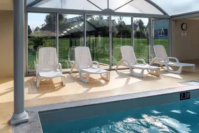 Image de Bel appartement dans une maison de vacances avec piscine, Wifi, Tv, terrasse, animaux admis, parking