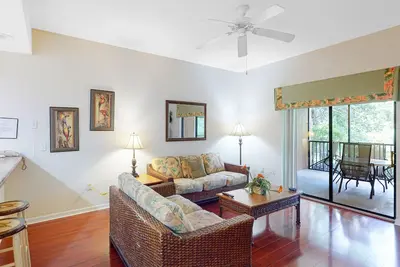 Image de 1st floor condo w/ patio, shared pools, gym, limited-mobility access, & sauna
