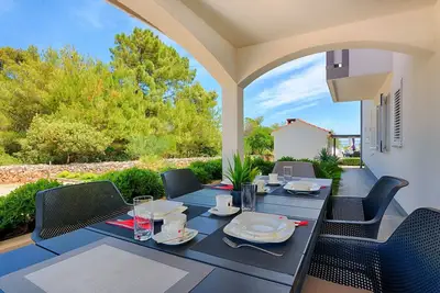 Image de Apartment with pool | Sea view | quiet location | for 4 per.