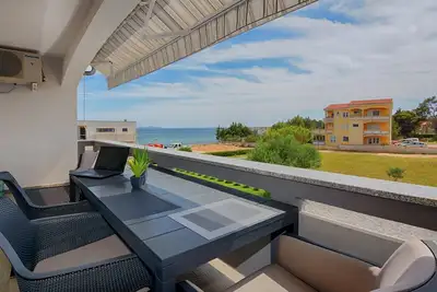 Image de Newly furnished apartment with pool | Quiet location | Sea view | for 6 per.