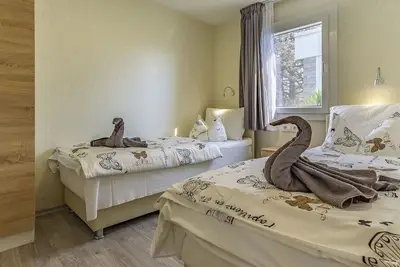 Image de Bel appartement dans une maison de vacances avec climatisation, piscine, Wifi, Tv, terrasse, parking
