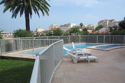 Image de Grand T2, central, terrasse, clim, piscine, garage, Wifi