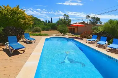 Image de Finca traditionnelle avec vue sur la campagne, piscine privée, proche des plages et à 300 m de Es Llombards!
