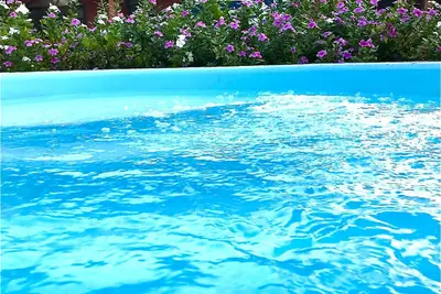 Image de Beach House, with swimming pool, Wifi, Air, party room, outdoor kitchen