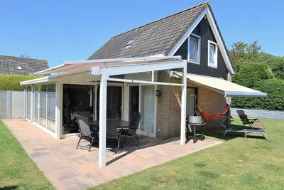 Image de Une maison accueillante avec une apparence luxueuse, oĂą vous pourrez passer de merveilleuses vacances sans soucis avec votre famille et votre ami Ă quatre pattes.