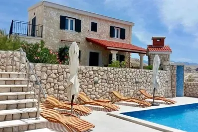 Image de Maison de vacances Novalja pour 1 - 5 personnes avec 2 chambres à coucher - Maison de vacances