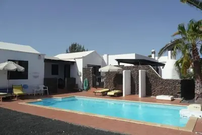 Image de Maison de vacances Playa Blanca pour 1 - 8 personnes avec 4 chambres à coucher - Maison de vacances