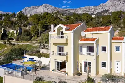 Image de Maison de vacances Podgora pour 2 - 6 personnes avec 3 chambres à coucher - Maison de vacances