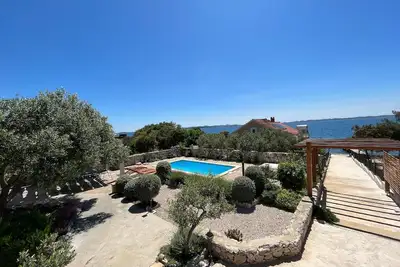 Image de Maison de vacances Dobropoljana pour 1 - 6 personnes avec 2 chambres à coucher - Maison de vacances