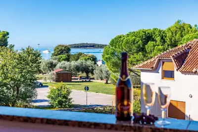 Image de Appartement de vacances Fažana pour 1 - 4 personnes avec 1 chambre à coucher - Maison jumelée
