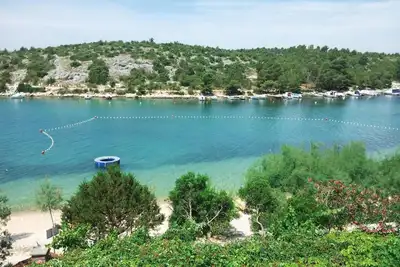 Image de Appartement de vacances Grebaštica pour 5 personnes avec 2 chambres à coucher - Maison mitoyenne