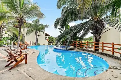 Image de Colorful classy modern split level unit near beach in Coco with pool