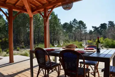 Image de Maison en bois vue sur la foret - 1km de la plage et du marché de Montalivet