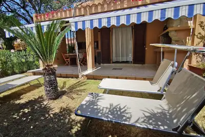 Image de Maison de vacances Costa Rei pour 1 - 6 personnes avec 2 chambres à coucher - Maison mitoyenne