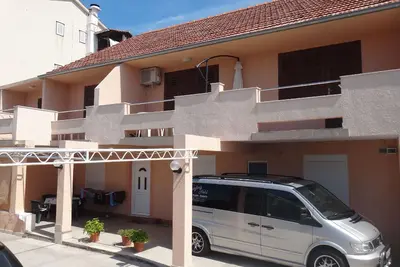 Image de Appartement de vacances Tisno pour 1 - 6 personnes avec 2 chambres à coucher - Maison mitoyenne