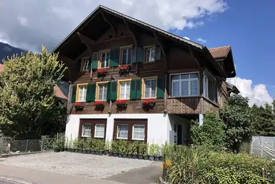 Image de Renovated flat in classic Chalet by the lake.