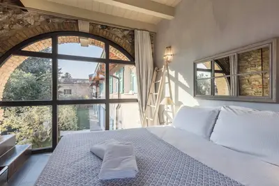 Image de Appartement \"Torretta\" dans la tour résidentielle avec Wi-Fi, jardin et piscine partagés